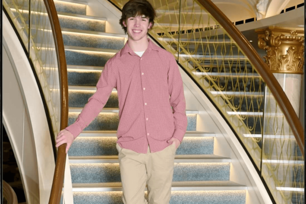 Image of Shenandoah University business student Nathan Simmons '25 on a staircase.