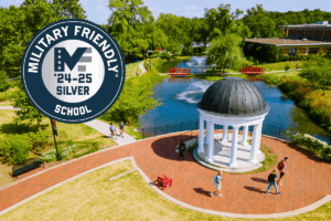 An aerial view of Sarah's Glen with the 2024-25 Silver Military Friendly School logo.