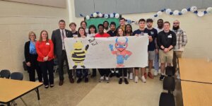 Shenandoah University students who mentored Bass-Hoover Elementary School students in Frederick County, Virginia, during the 2023-24 school year, along with Frederick County Public Schools administrators.