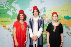 Shenandoah University students pose in traditional Arabic clothing.