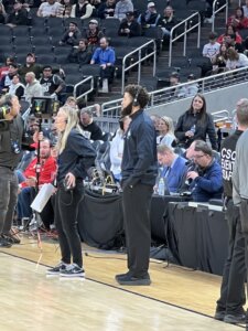 Shenandoah University students stand courtside during the Indy Classic.